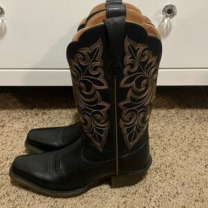 Black and gold boots
